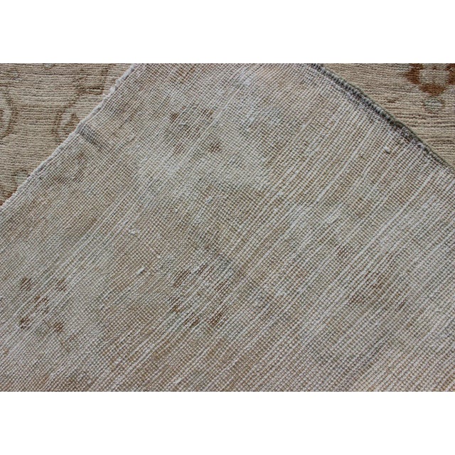 Muted Oushak Hand Knotted With All-Over Tribal Design in Light Tones of Taupe and Browns For Sale - Image 11 of 12