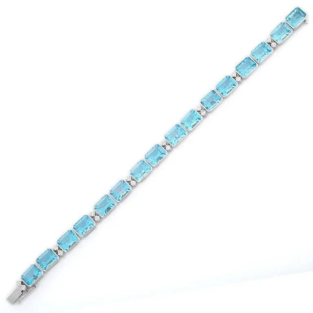 Metal 18 Karat White Gold Diamond and Fine Cut 40 Carats Blue Topaz Tennis Bracelet For Sale - Image 7 of 10