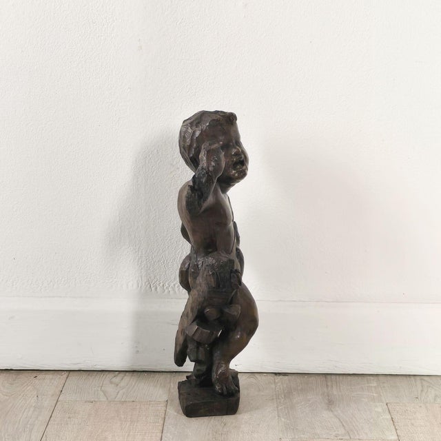 An Italian Baroque putto, 18th century.