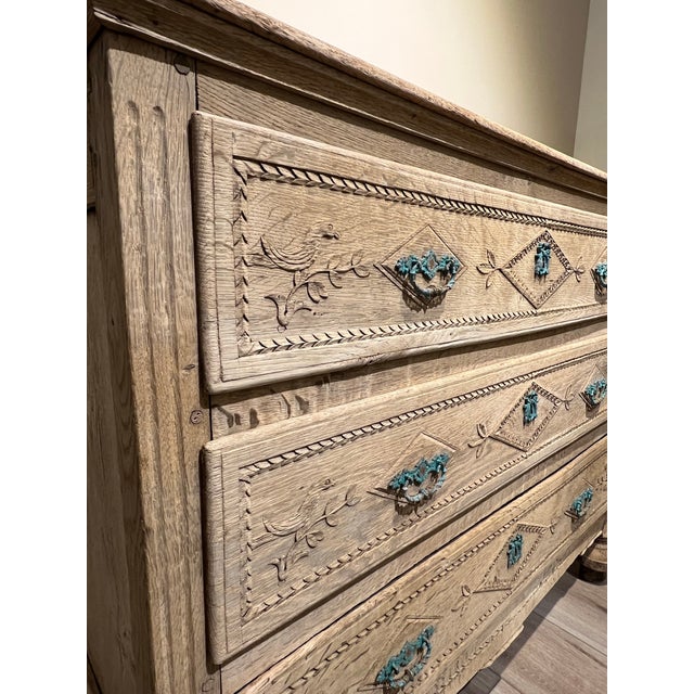 A beautifully proportioned 19th century French chest of drawers, crafted in solid oak and finished in a softly bleached,...