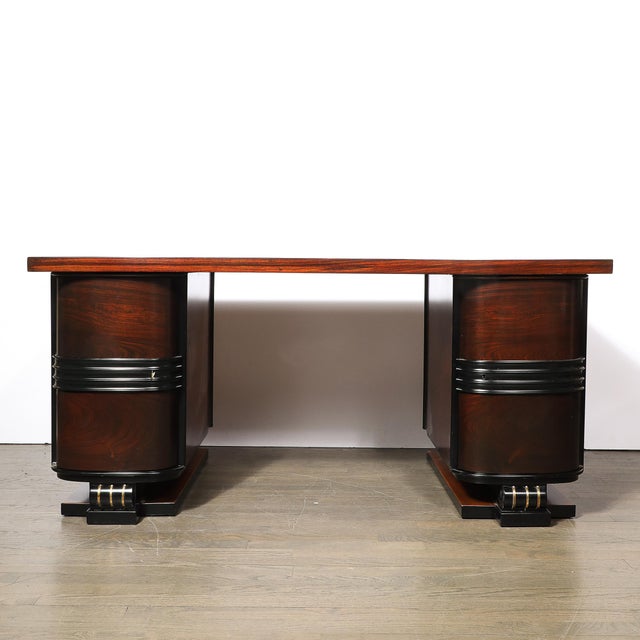 This Art Deco Machine Age partner desk, crafted in France circa 1940, is an exceptional example of streamlined...