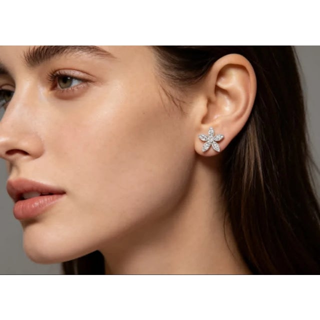 Material: 14K White Gold - durable and elegant Stones: Brilliant Round Diamonds - total carat weight (add if known)...