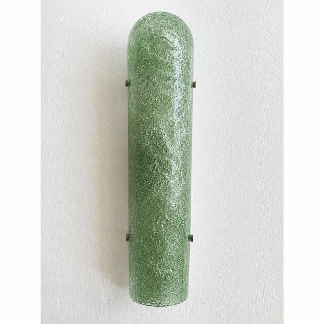 Contemporary luxury modern wall sconces made in green hammered murano glass with a traditional working of "graniglia". lot...