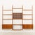 This elegant mid-century wall unit closely resembles poul cadovius and preben sorensen designs and was made in denmark in...