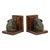 A fine pair of heavy, handmade asian-style bookends; the elephants are crafted from patinated bronze, the book elements...