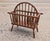 This vintage American-style magazine rack brings rustic warmth and timeless craftsmanship to any space. Handcrafted from...