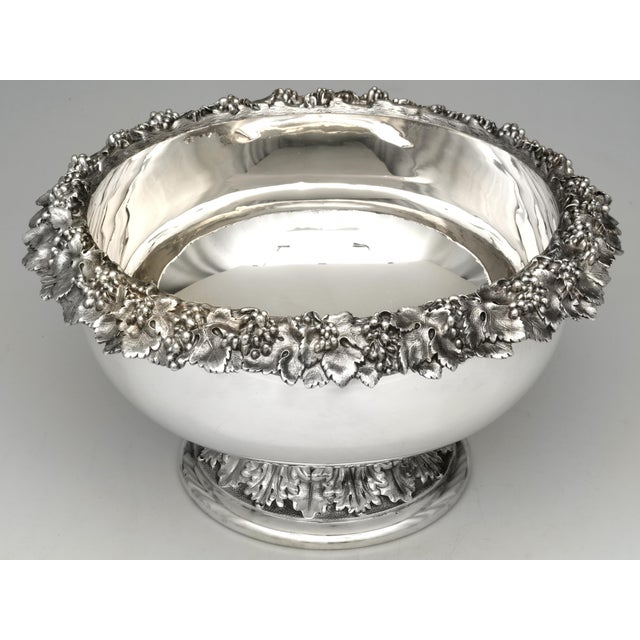This exquisite Spaulding & Co. (Gorham) sterling silver punch bowl showcases the elegance and craftsmanship of one of...