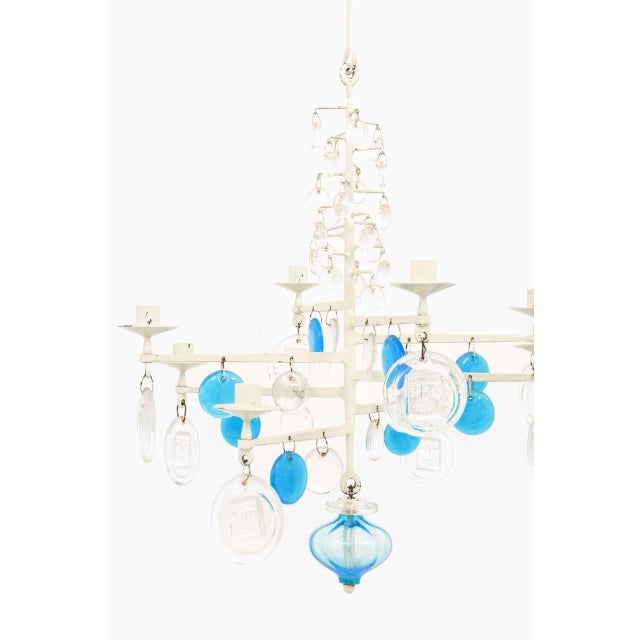 Hanging candelabra designed by Erik Höglund. Produced by Boda in Sweden. Wear consistent with age and use. This piece is...