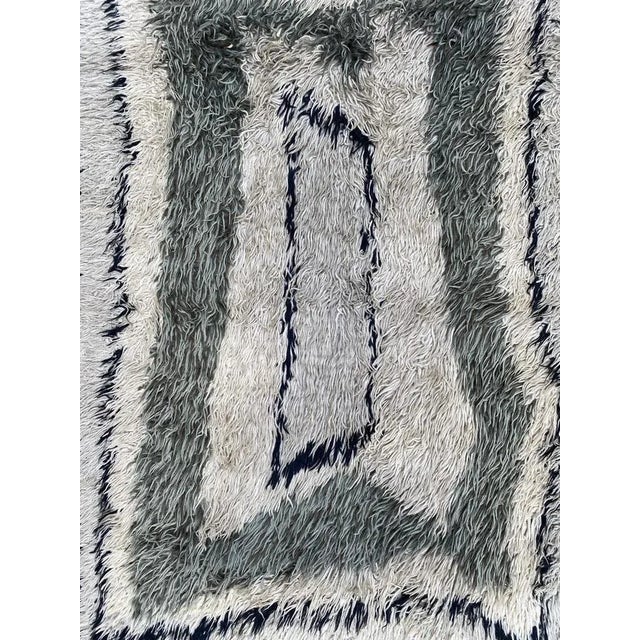 Nice modern design Scandinavian rug with beautiful light colors, entirely hand knotted with wool velvet on cotton foundation.