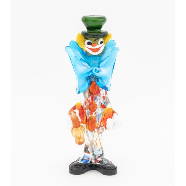 Group of Two Murano Art Glass Clown Sculptures, one with "Made in Murano Italy" label to shoe. Larger: 12" H x 4.5" W x 3"...