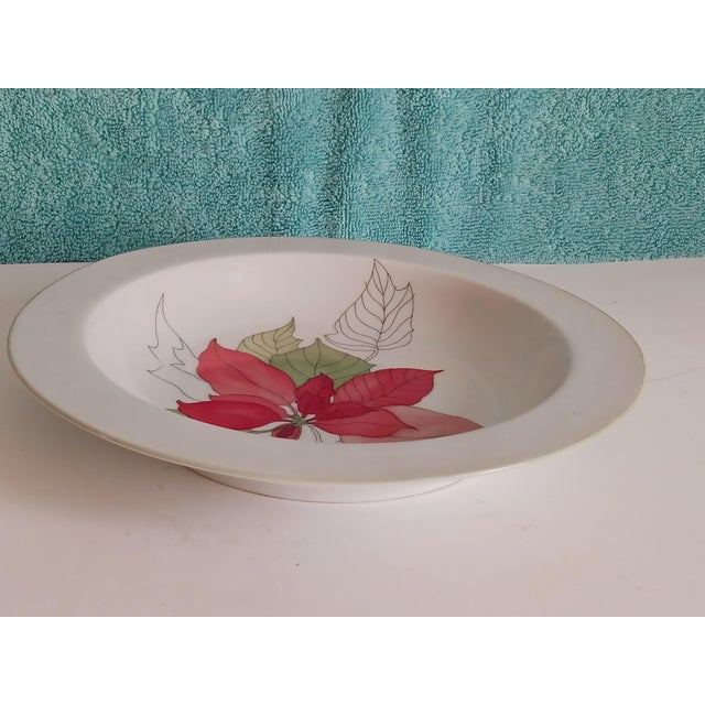 Festive bowls are 8 3/4" wide and 1 1/2" deep for soup or pasta. Marked with maker, artist and date 1982.