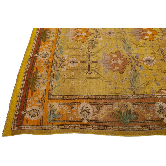 Vintage Arts and Crafts Style Golden Ochre Wool Rug With Stylized Floral Motif For Sale - Image 9 of 11