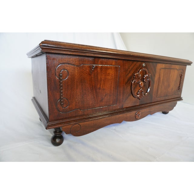 Beautiful vintage cedar-lined hope chest in excellent condition with gorgeous carved detailing and a spacious aromatic...
