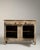 A solid oak buffet reflecting traditional French craftsmanship, with a strong emphasis on durability and practical...