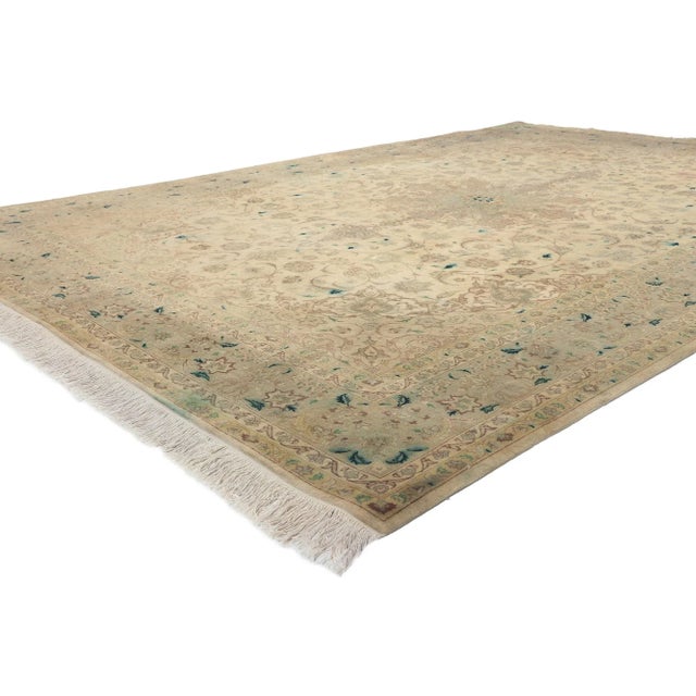 76976 Vintage Persian Tabriz Rug, 06'08 x 10'00. Refined elegance meets soft, bespoke Bridgerton style in this hand...