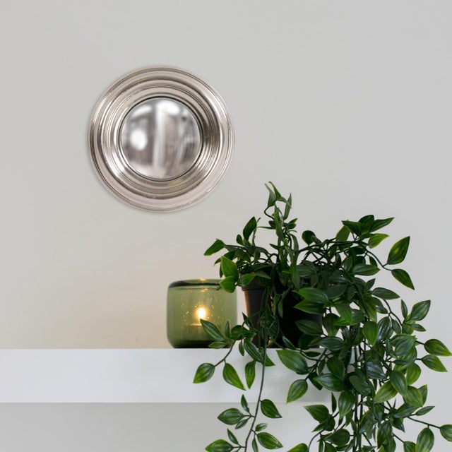 The Sylvia Mirror is a simple mirror, but big on style. It features a deep concave round grooved frame. It is finished in...