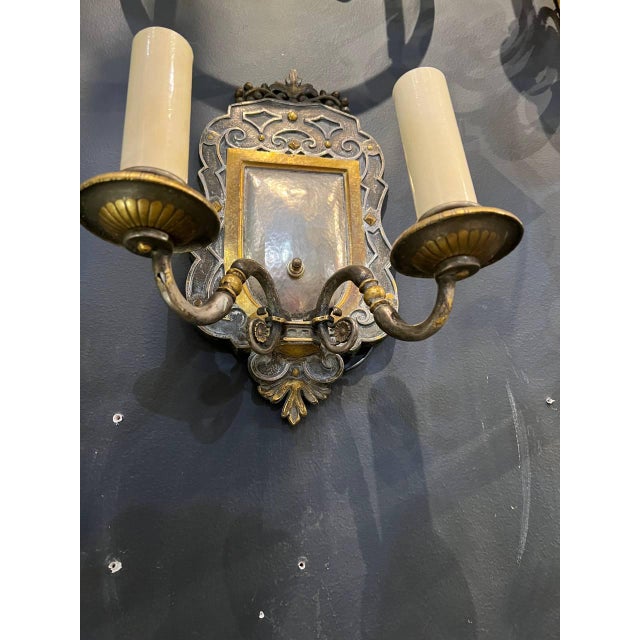Circa 19th century silver plated and bronze sconces with two lights