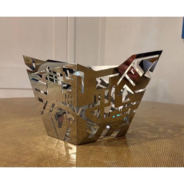 This is a chromed-steel "Hellraiser" Citrus Basket, designed by Karim Rashid for Alessi in 2011. The piece was produced in...
