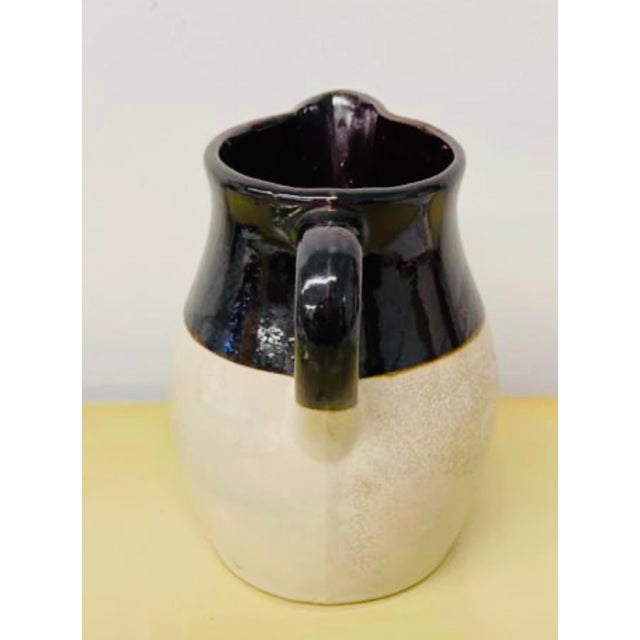 Vintage Roseville Pottery Stoneware Brown & Cream Pitcher with Handle from the 1960’s. Excellent vintage condition....