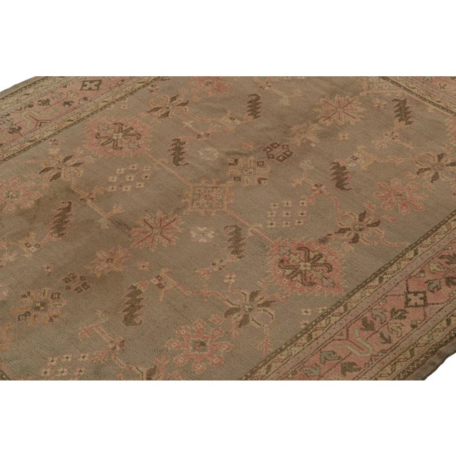 Originating from Turkey circa 1920-1930, this hand-knotted 7x9 wool rug joins the celebrated Oushak selections in Rug &...