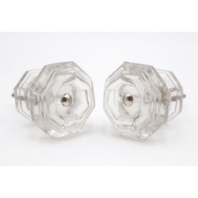 Vintage cabinet or drawer knobs made of clear glass in an octagon shape. The original mounting nuts are not included. Good...