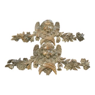Early 20th Century Pair of Carved Putti Decorative Wall Plaques For Sale