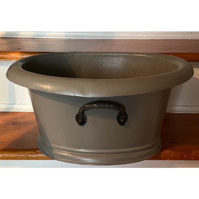 Antique 19th century French Second Empire tole oval jardiniere cachepot planter with black mask handles and wide rolled...