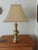 Bring timeless warmth into any space with this beautifully crafted solid brass table lamp, featuring a polished,...