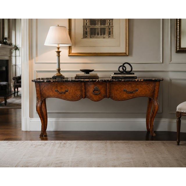 An impressive vintage console table by Mastercraft Furniture Co. of Grand Rapids, Michigan, combining richly figured burl...