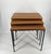 Nesting Tables * 3 nesting tables with teak tabletops * Straight, flat steel legs, black * Mid-Century design Dimensions...