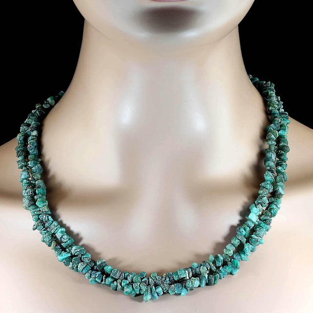 Two 34-inch infinity-style emerald chip necklaces create a striking, effortless look that feels both natural and...