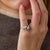 This exceptional Art Deco engagement ring is a beautifully detailed jewel from the 1920’s, centered by a GIA-certified...