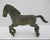 Small vintage bronze replica of a Han Dynasty galloping Horse figure featuring a green patina. Excellent condition. Very...