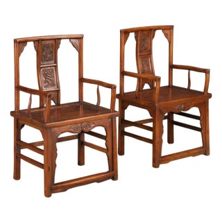 Pair of Qing Dynasty Chinese Horseshoe-Back Armchairs in Carved Elmwood For Sale