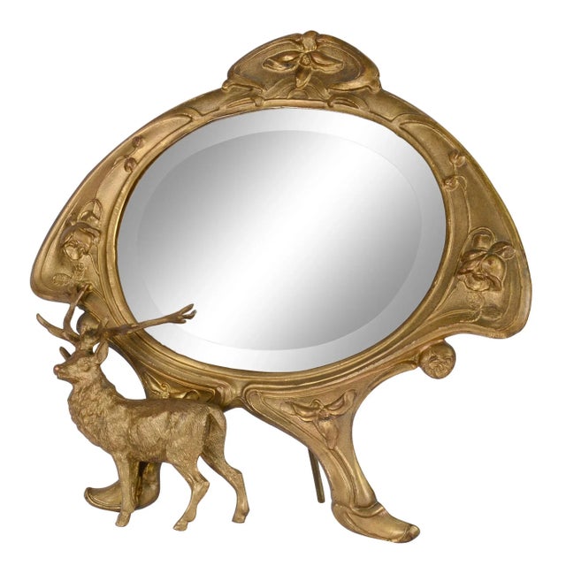 Antique American Art Nouveau gilt bronze dressing mirror, circa 1890. This Art Nouveau dressing mirror features beveled...