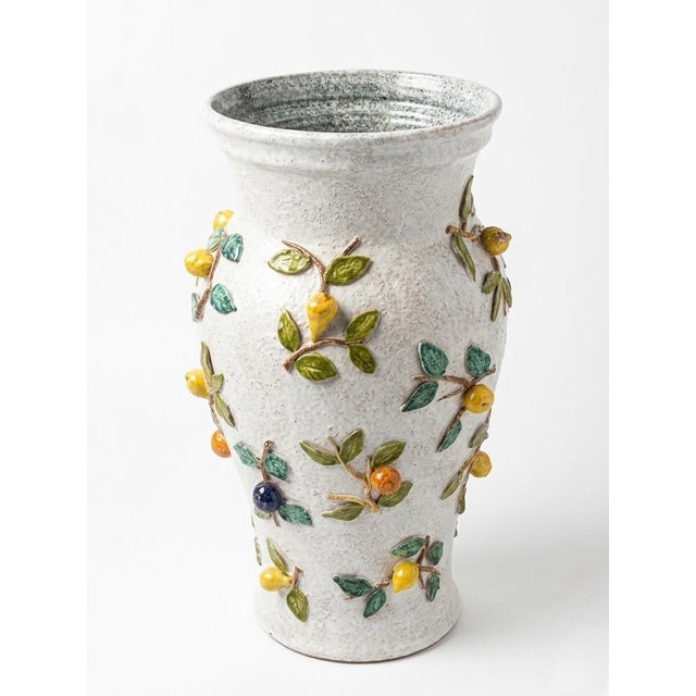 This exquisite vintage Italian ceramic vase is a masterful example of mid-century Majolica craftsmanship. Featuring a...