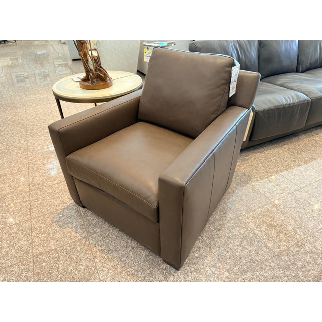 This luxe Hancock & Moore lounge chair is upholstered in smooth, top-quality brown leather that showcases Hancock &...