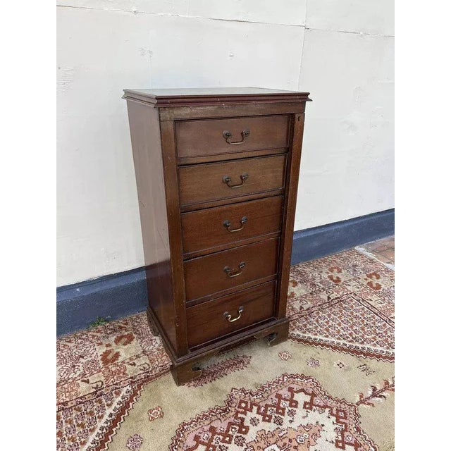 Weekly marine secretary with secret side closure. the secretary is hidden behind a drawer. 5 drawers. Good condition....