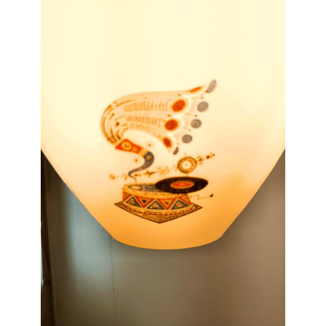 Suspension Lamp with Drawings, in Very Good conditions. Designed 1950 to 1959 Up to 250V (Europe/UK Standard).The wiring...