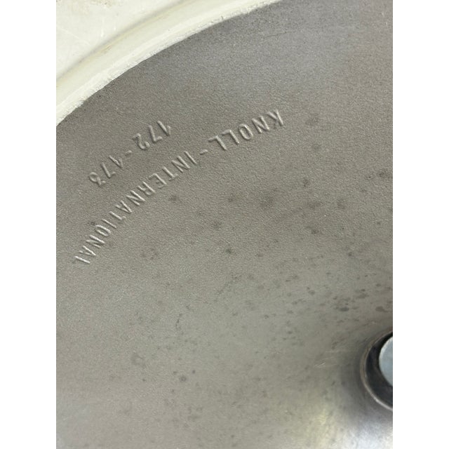 “Tulip” dining room table, created in 1956, with central base in cast aluminum and circular top in Calacatta gold marble...