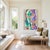 The colorful abstract artworks of Romanian artist Alex Voinea are inspired by experiments with paint poured over vibrating...