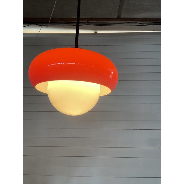 Vintage guzzini orange space age pendant lamp ufo chrome italian design 1970s ceiling lamp a bold space age pendant lamp...