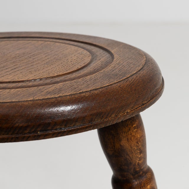 Rendered in the spirit of French provincial craftsmanship, this distinguished pair of bobbin stools from circa 1970...