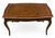 This is a French Louis XV-style bureau plat (flat-top writing desk) featuring a leather-insets top, shaped serpentine...