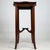A charming and beautifully crafted early 20th-century English Edwardian side table, finely constructed in mahogany and...