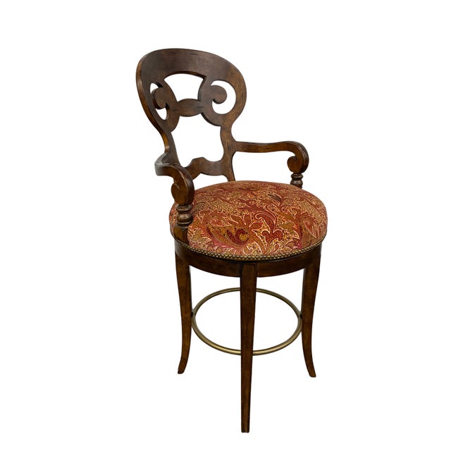 Elegant pair of Century Furniture swivel bar stools crafted in a warm, richly finished hardwood. Each stool features a...