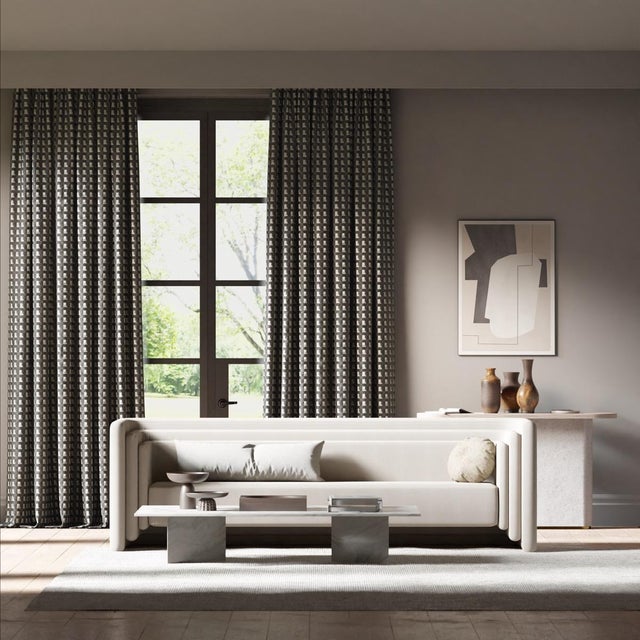 With a strong architectural look this largescale checkerboard design is inspired by a traditional artisan weave. Woven...