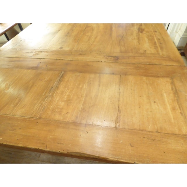 This 19th Century Italian pine table measures 32"H x 73"L x 39"D when open and 39"square when closed. It seats 4, but can...