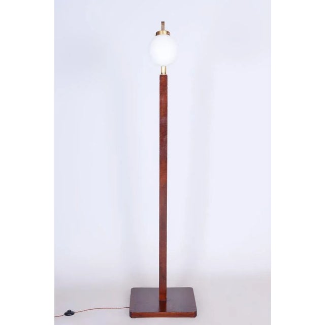 Restored Art Deco floor lamp Origin: Czech Period: 1930-1939 Material: Walnut, Brass, Milk glass, Polish It has been re-...