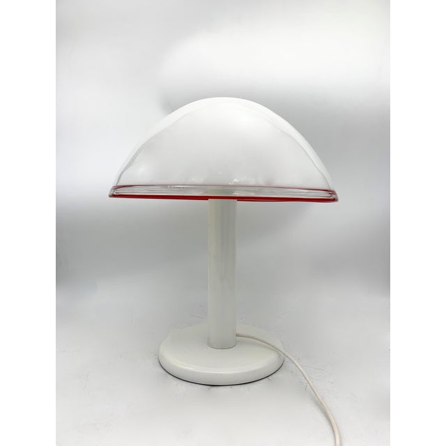 Table lamp in good condition. Attributed to the Leucos company. Load-bearing part in white painted iron, original colour....
